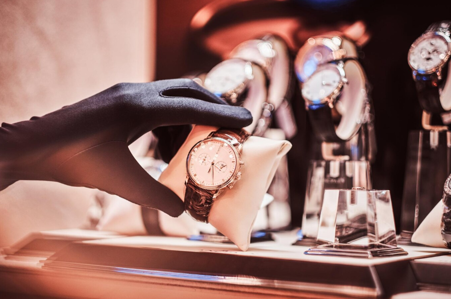 Luxury wristwatch showcased in a display case, highlighting high-end purchases that appreciate over time